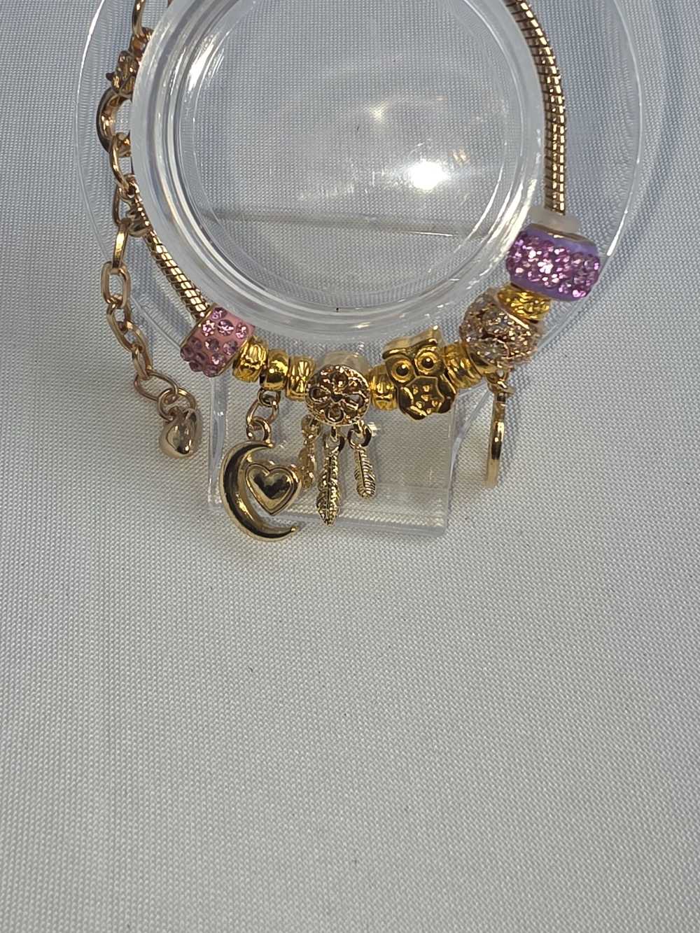 Gold Charm Bracelet with Pink Crystal Beads